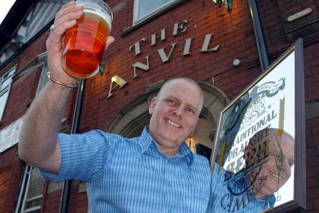 Ian Thorpe, landlord of The Anvil, Dorning Street, Wigan, holds The Alan Ball Award in Pub of the Year 2002, awarded by CAMRA - The Campaign for Real Ale.
