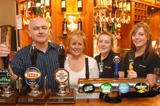 Staff at The White Swan, Pemberton, landlord and landlady Ged and Sue Bannister with barmaids Alice Bond and Louise Hunter, 2007.