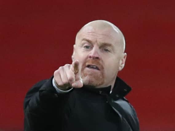Burnley's English manager Sean Dyche gestures during the English Premier League football match between Liverpool and Burnley at Anfield in Liverpool, north west England on January 21, 2021.