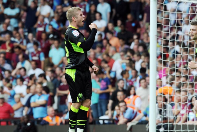 Midfielder Adam Clayton celebrates with the travelling faithful after scoring his first goal for Leeds United. It came away at West Ham United in August 2011. The game finished 2-2.