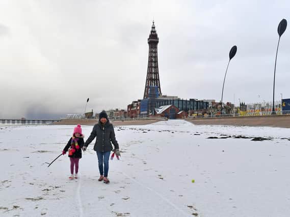 A snowy walk on the beach in Blackpool. Photos by Dave Nelson