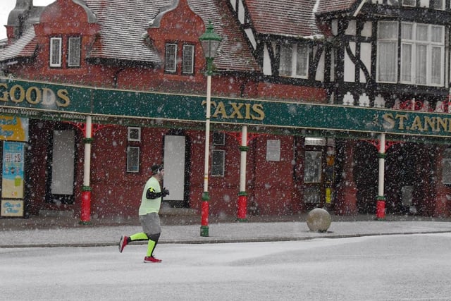 A jogger braves the cold in St Annes