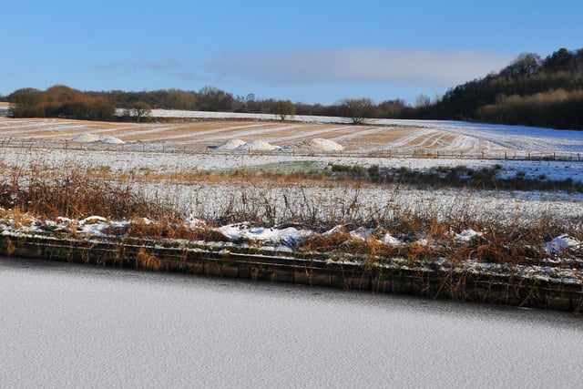 View over frosty fields and canal at Top Lock, sent in by Chris Winstanley.