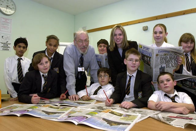 Manager Ted Price with pupils from West Leeds High School at the Yorkshire Post Newspapers Resource Centre. Also on the picture is teacher Zoe Earnshaw.