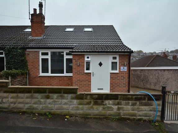 With PVCu double glazing, the property features: A new roof, wiring, plumbing, gas central heating, boiler, kitchen, bathroom and flooring. As well as neutral decor throughout. The accommodation comprises to the ground floor: A modern fitted kitchen, a spacious lounge / dining room, two bedrooms and a guest w.c.. On the first floor are: Two double bedroom and a modern shower room. Outside there are low maintenance paved gardens to three sides. To the side is a detached garage with drive providing ample off street parking.