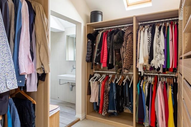 The house boasts its own large walk-in dressing room with comprehensive fitted shelving, hanging and storage. Other bedrooms have walk in wardrobes fitted with comprehensive hanging and storage.
