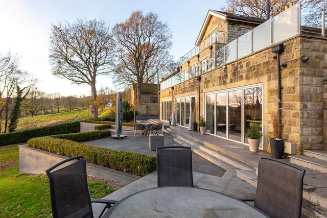 The property sits within tranquil grounds extending to approximately four acres, with additional glazed balconies set off various rooms, along with landscaped terraced areas designed to take in the breath-taking surroundings, river and countryside views. To the immediate rear, the formal gardens boast a built in BBQ and fire pit.