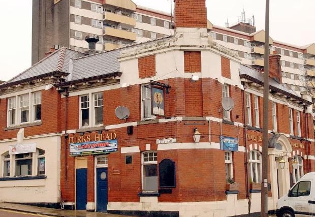 An old photo showing the Turks Head Pub on Gillygate, it is now an accountancy firm