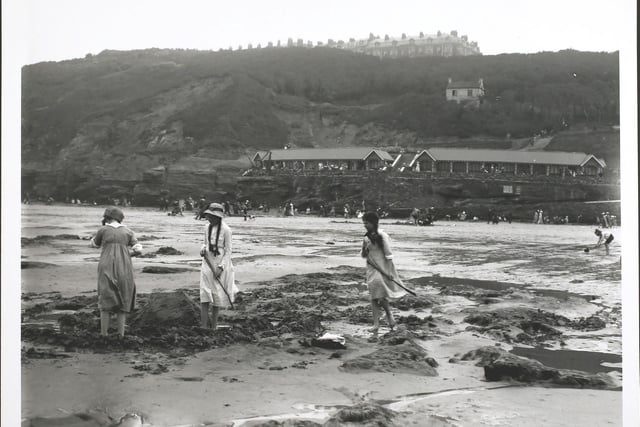 Shrimping on the beach at Scarborough sands, circa 1912.