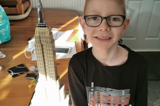 Michelle Stringer shared this photo of her son with one of many of his creations.