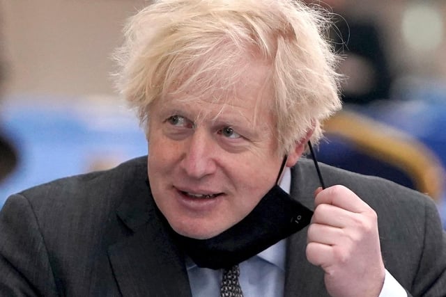 Prime Minister Boris Johnson as he visits a COVID-19 vaccination centre in Batley,