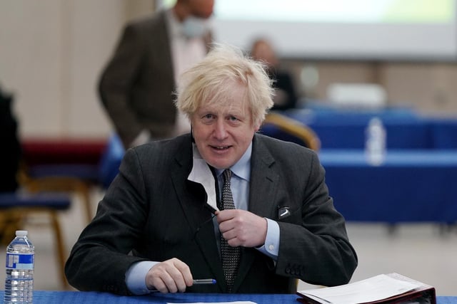 Prime Minister Boris Johnson as he visits a COVID-19 vaccination centre in Batley,