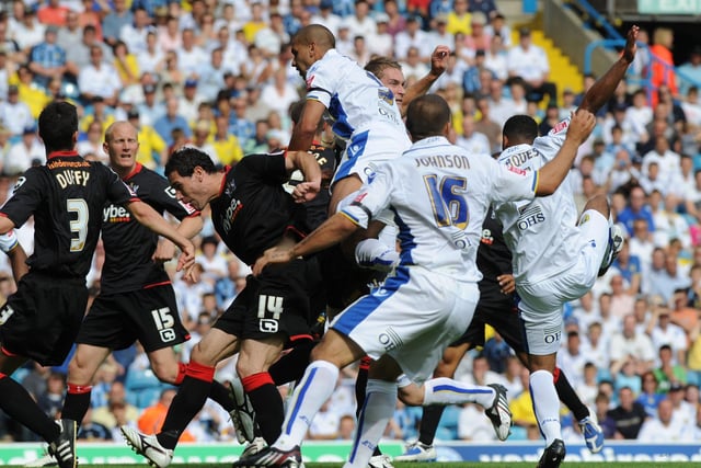 Patrick Kisnorbo rises the highest during his league debut against Exeter City in August 2009.