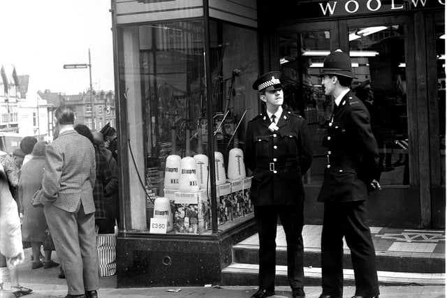 A bomb scare, which proved to be a hoax call, disrupted shopping in Woolworths store Standishgate, Wigan, in 1971