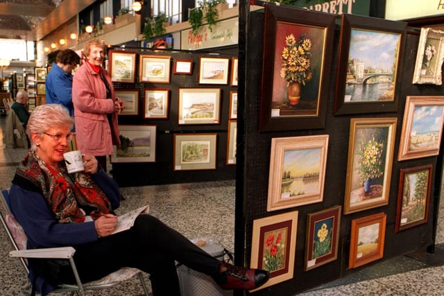 March 1997 and Leeds Painting and Sketching Club held their Spring show with more than 100 paintings on display at Crossgates Shopping Centre. Club assistant exhibition secretary Mavis Greenwood takes a coffee break.