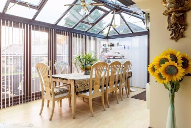 The light and airy orangery area provides an additional seating area, perfect for summer.