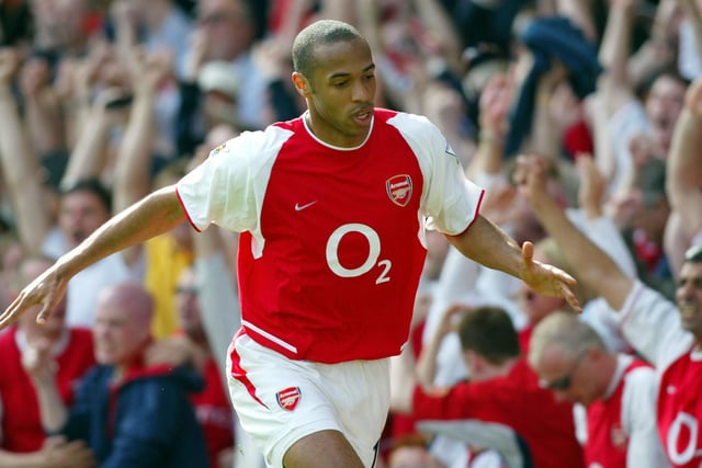 Thierry Henry celebrates after nodding into an empty net to equalise for Arsenal.