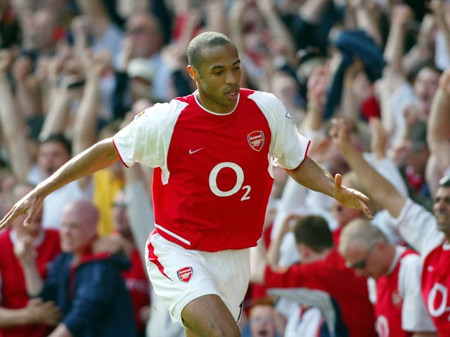 Thierry Henry celebrates after nodding into an empty net to equalise for Arsenal.