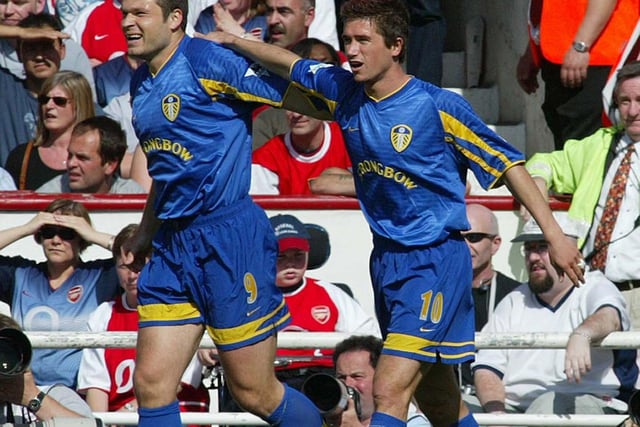 Harry Kewell celebrates with Mark Viduka after smashing in a stunning opener after five minutes.