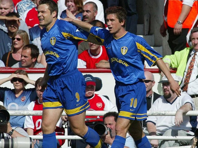 Harry Kewell celebrates with Mark Viduka after smashing in a stunning opener after five minutes.