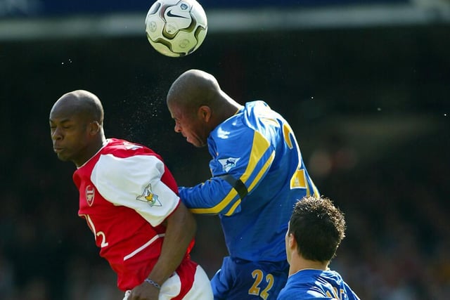 Michael Duberry rises above Arsenal's Sylvain Wiltord to head clear.