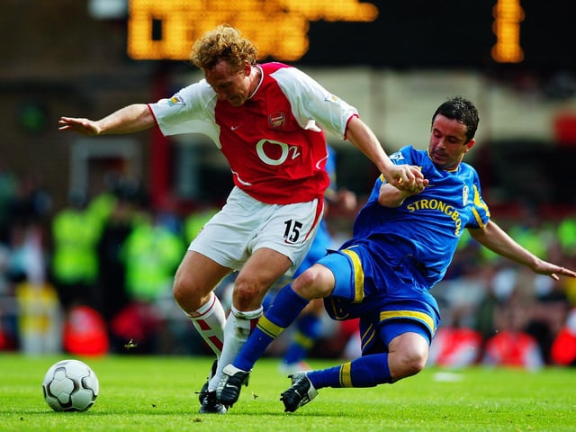 Gary Kelly battles for the ball with Arsenal's Ray Parlour.