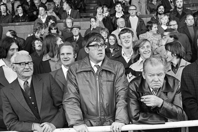 Fans watching the Northern Premier League match between Wigan Athletic and Skelmersdale United at White Moss Park on Saturday 23rd of August 1975.
Latics won 2-1 with goals from John Rogers and Mickey Worswick.