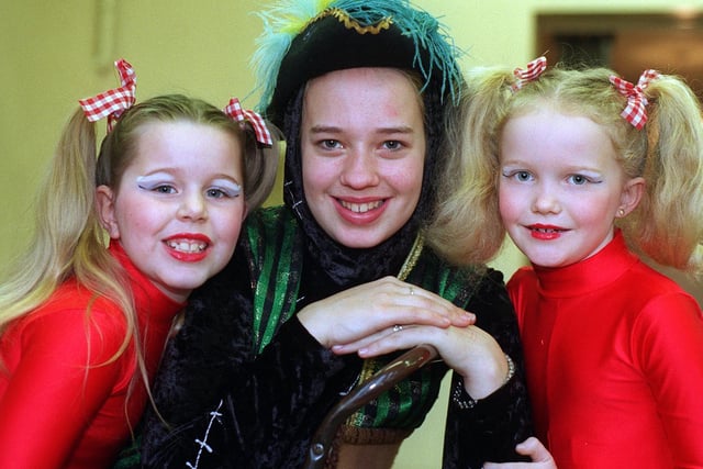February 1997 and The Crossgates Village Welfare Association's pantomime Puss In Boots was being held at the Penda's Way Community Centre. Pictured is principal character Claire Brown with young dancers Terri Marie Calvert (left) and Caroline Hardy.