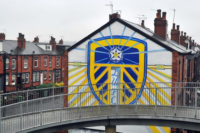 Shane Green, from Otley, created this mural of the Leeds United badge across two end of terraces on Tilbury Mount in Holbeck, near the footbridge for the M621.