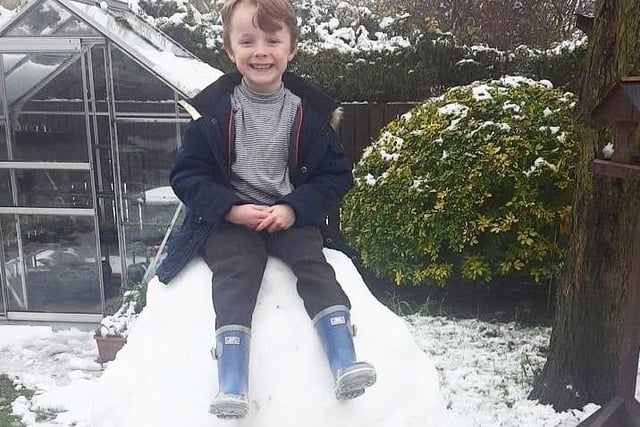 Oliver was - quite literally - top of the class snowball competition with a snowball bigger than he was!