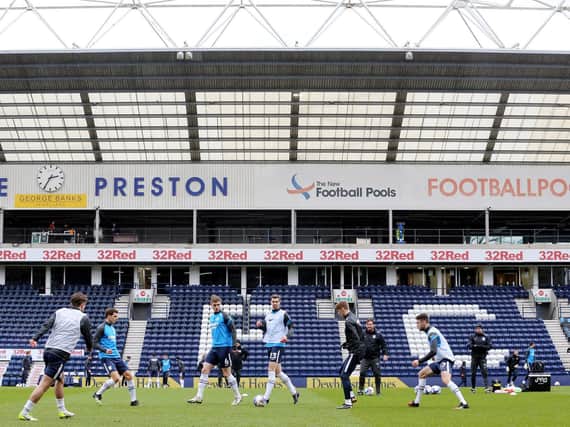 The PNE players warm up before the game.