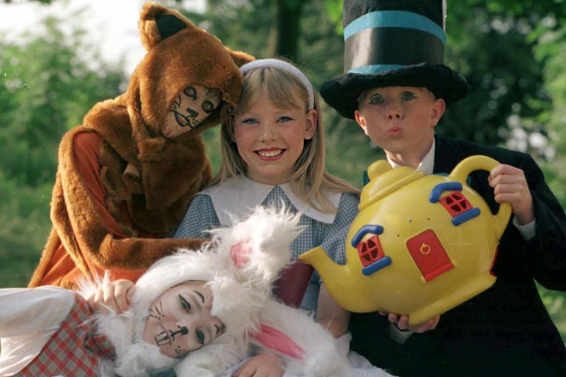 Pupils from the Beeston Primary ahead of their production of Alice in Wonderland. Pictured are Rebecca Rawson Alice), Danielle Schofield (The Cheshire Cat), Liam Smith (The Mad Hatter) and Craig Dinnewell (The White Rabbit).