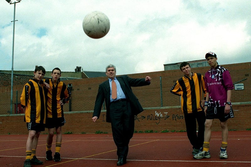 Leeds United chairman Peter Ridsdale tests his footballing skills after presenting a cheque for £7,000 to Holbeck Youth Club. Also pictured are Holbeck Hornets football team based at the Club. They are Gareth Robinson, Robert Kitchingman, Matthew Allotey and  and Benjy Baker.