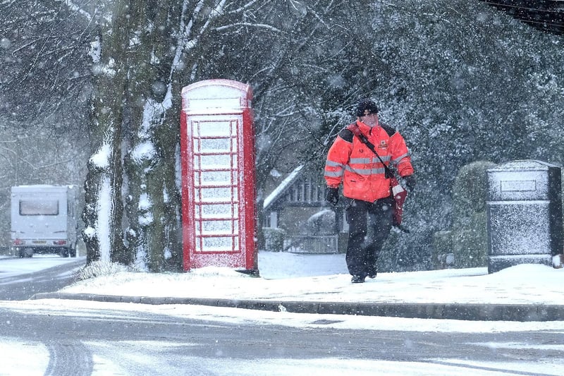 A Postman at work in Scalby Village