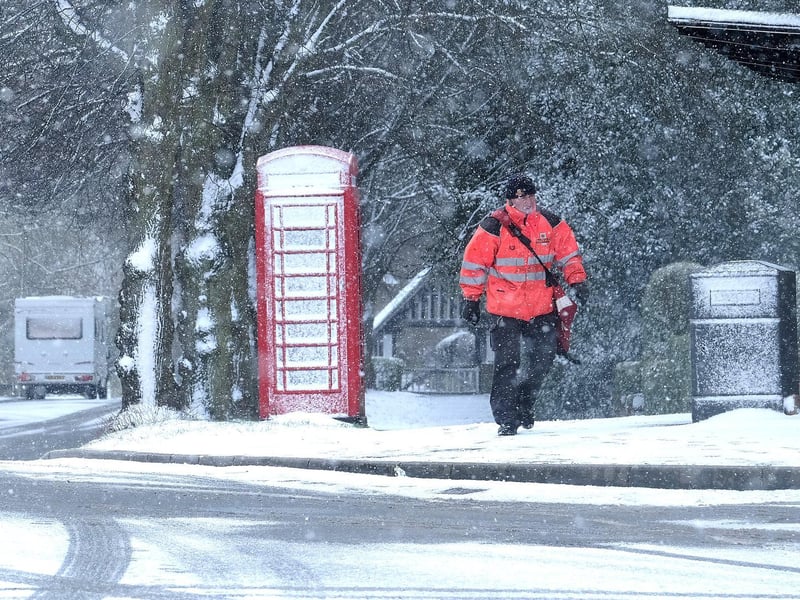 A Postman at work in Scalby Village