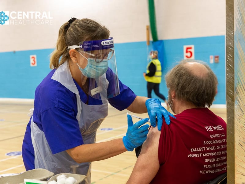 Central Healthcare Staff Nurse Diana Wilkinson carries out vaccinations.