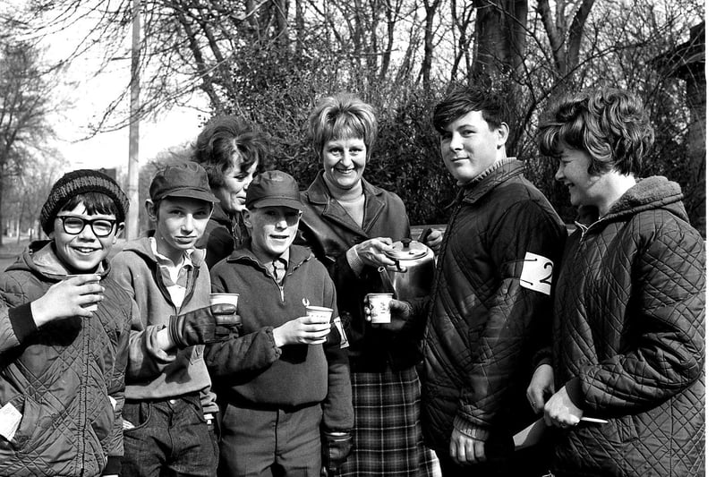 A group of charity walkers from St John's Church, Hindley Green, pause for a tea break in 1970