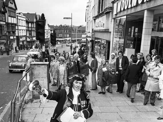 A town cryer on Standishgate in Wigan town centre in 1974
