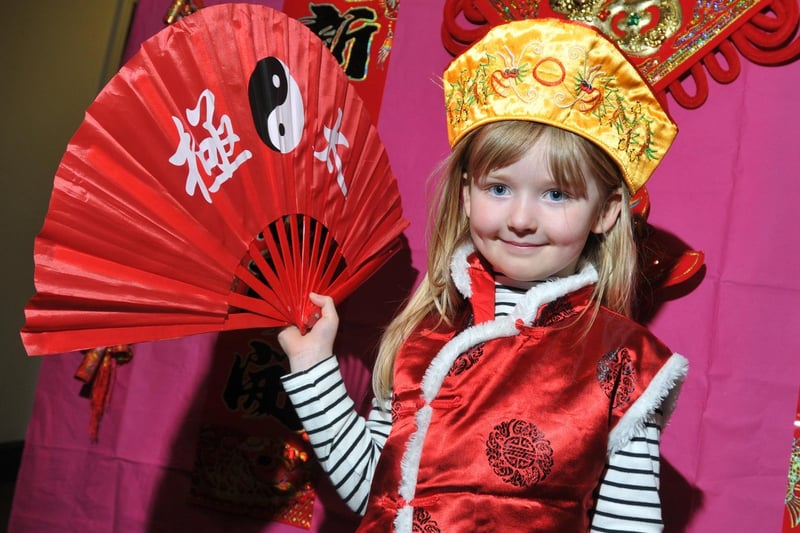 Niamah Suffin, four, dressed up as children take part in a variety of Chinese art and crafts sessions held by members of The Confucius Classroom, part of the Chinese New Year celebrations at The Museum of Wigan Life in 2018.