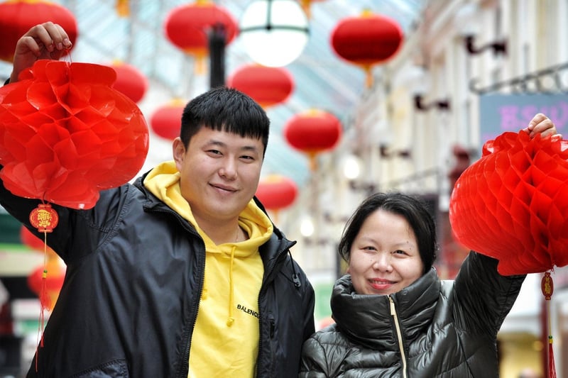 Confucius Classroom's Aoqi Li and Wei Nan celebrate Chinese New Year with craft and lantern making at Makinson Arcade, Wigan in 2019.