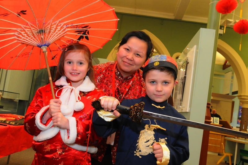 from left, Melissa Duke-Haydock, Confucius Classroom manager Wei Nan and William Armstrong in traditional Chinese dress, part of 2016 Chinese New Year celebrations at the Museum of Wigan Life.
