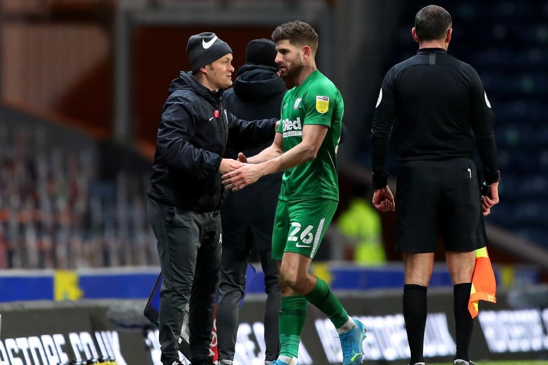 Ched Evans gets a pat on the back from Alex Neil after being substituted late in the game