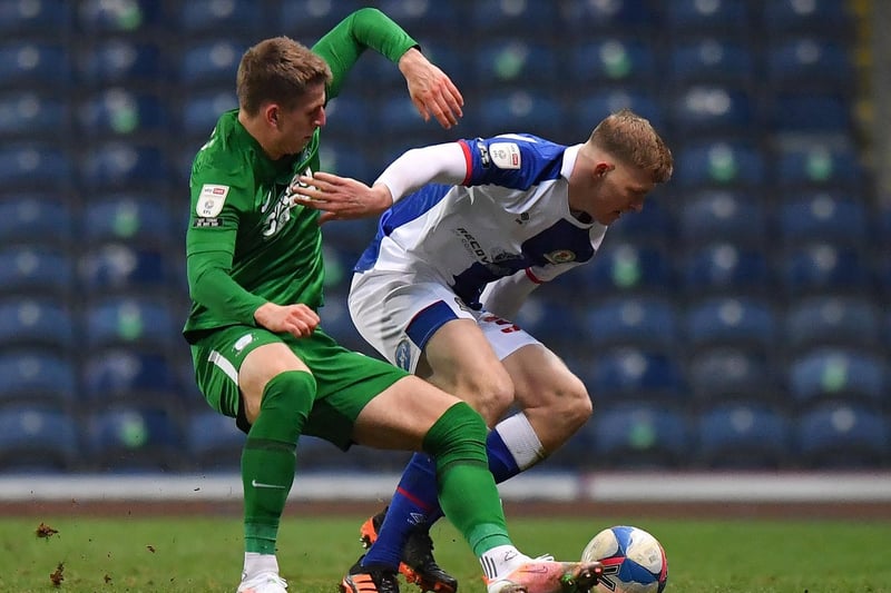 North End substitute Emil Riis tussles for the ball against Blackburn