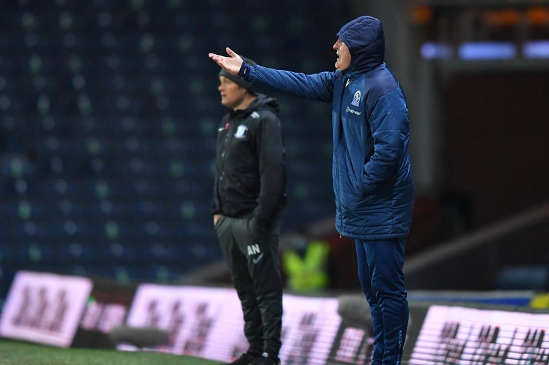 Blackburn manager Tony Mowbray and his PNE counterpart Alex Neil watch from the sidelines