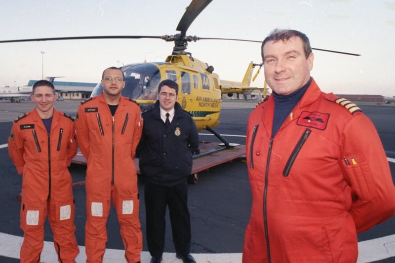 Flight paramedics Allan Dunn and Richard Peters, operations manager Wayne Ashton, and pilot Capt Iain King, of the Lancashire North West Air Ambulance, who have made nearly 300 life-saving missions since its launch nine months ago