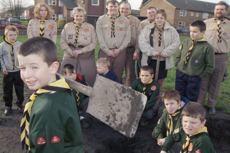 Members of a Chorley youth group have buried special time capsules to tell future generations about Scouting in the new millennium. Boys and girls from the Chorley All Saints group buried badges and messages explaining what they liked about being a member of the organisation. Above, nine-year-old Daniel Roden helps plant the time capsule with fellow cubs, scouts and leaders from the All Saints pack