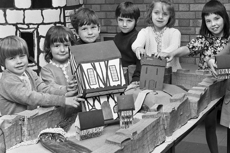 Infant children with models, made before a visit to York, at the old Birchley St. Mary's RC Primary School, Billinge,in 1972.