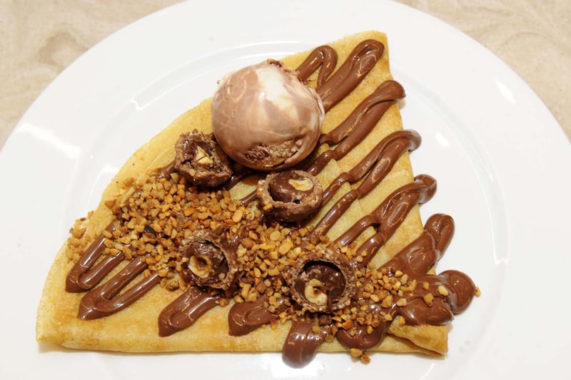 The Headingley dessert parlour serves up crepes with extravagant toppings. Pictured is the Royale Crepe - chocolate lovers will adore the warm nutella, chopped nuts, and crushed ferrero rocher chocolates. Finished with a creamy scoop of hazelnut supreme gelato. Order on Uber Eats.