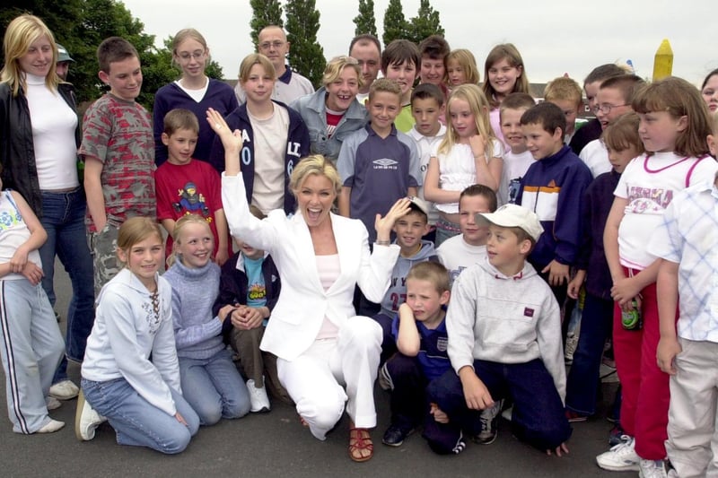 Model and TV Star Nell McAndrew made a surprise visit to Bramley St Peter's Primary summer fete in June 2003.