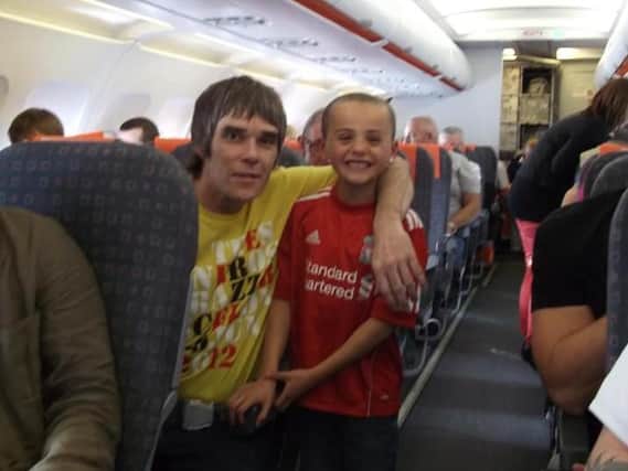 Samantha Ellie-Jaye Sumner sent us this picture of her son with Ian Brown on a plane to Spain